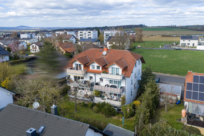 14_R�ckansicht 2 Etagenwohnung Langg�ns