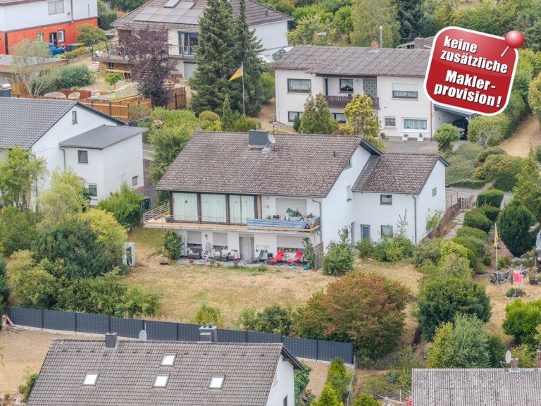 Titelbild Langg�ns / Cleeberg Mehrfamilienhaus Voll vermietetes Mehrfamilienhaus mit 3 Wohneinheiten - provisionsfrei