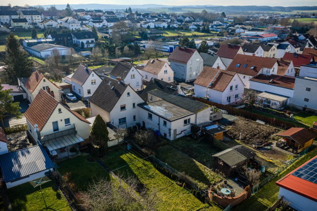 R�ckansicht Einfamilienhaus Langg�ns