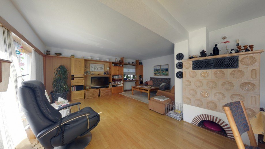 Wohnzimmer mit Kachelofen Einfamilienhaus A�lar / Werdorf